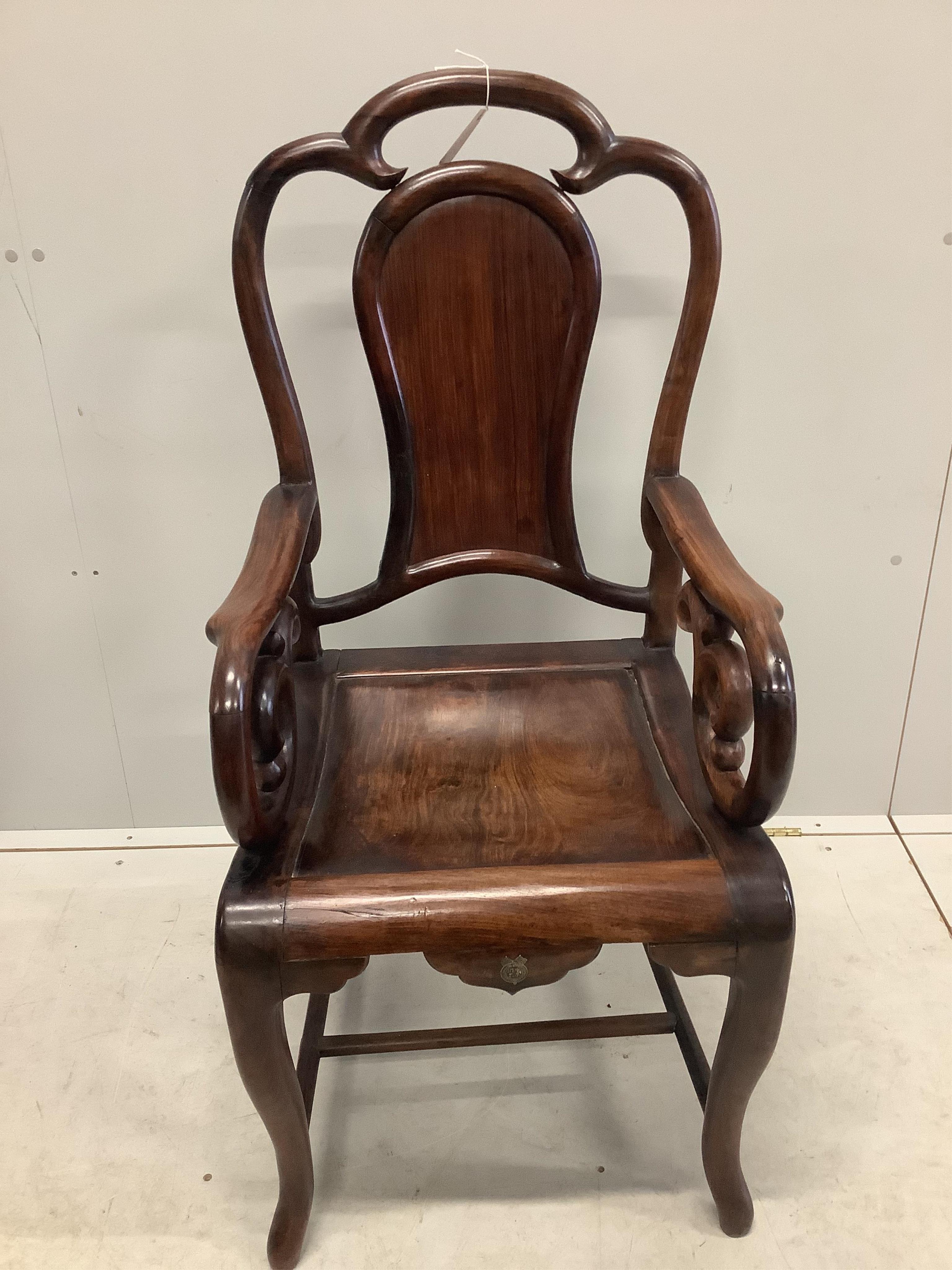 A pair of Chinese hongmu elbow chairs exhibited at British Empire Exhibition Wembley 1924, width 52cm, depth 48cm, height 110cm. Condition - fair to good